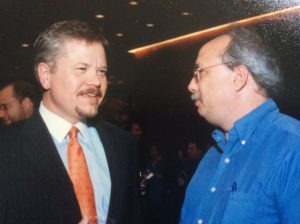 John Goff, left, of Crescent Real Estate, visits with Realty News Report editor Ralph Bivins at the grand opening of the 5 Houston Center building in 2002.